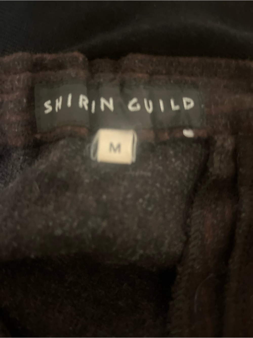 Shirin Guild Black and brown asymmetrical skirt made in the UK